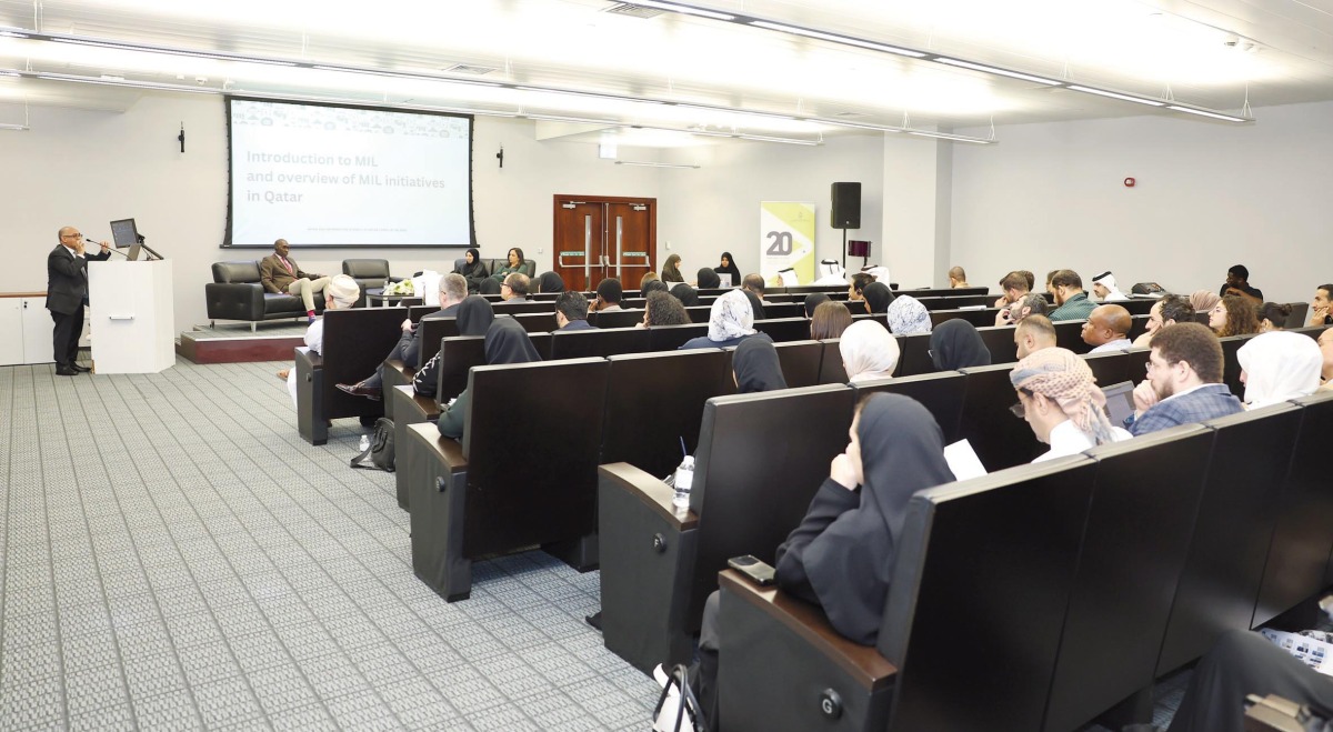 Participants listening to a speech at the event.