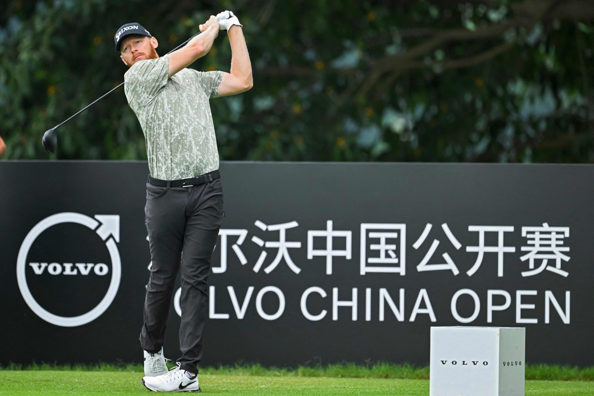 Sweden's Sebastian Sِderberg plays a shot during the second round of China Open Golf tournament in Shenzhen, in southern China's Guangdong province on May 3, 2024. (Photo by AFP) 