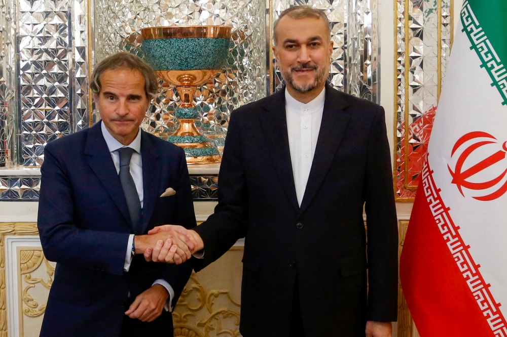 Iranian foreign minister Hossein Amir Abdoulahian (R) meets with UN atomic watchdog chief Rafael Grossi in Tehran, Iran, 06 May 2024. Photo by AFP.