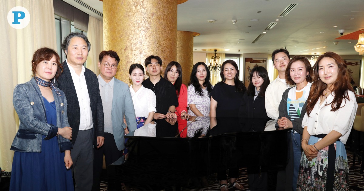 Korean Performers with Art Director and Conductor of the Gugak Orchestra Lee Yong Tak. Pic by Salim Matramkot/The Peninsula