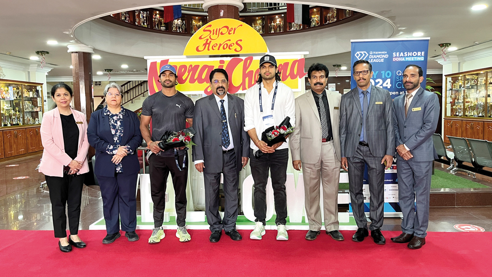 BPS officials with Indian athletes Neeraj Chopra, Kishore Jena during their visit to the school.