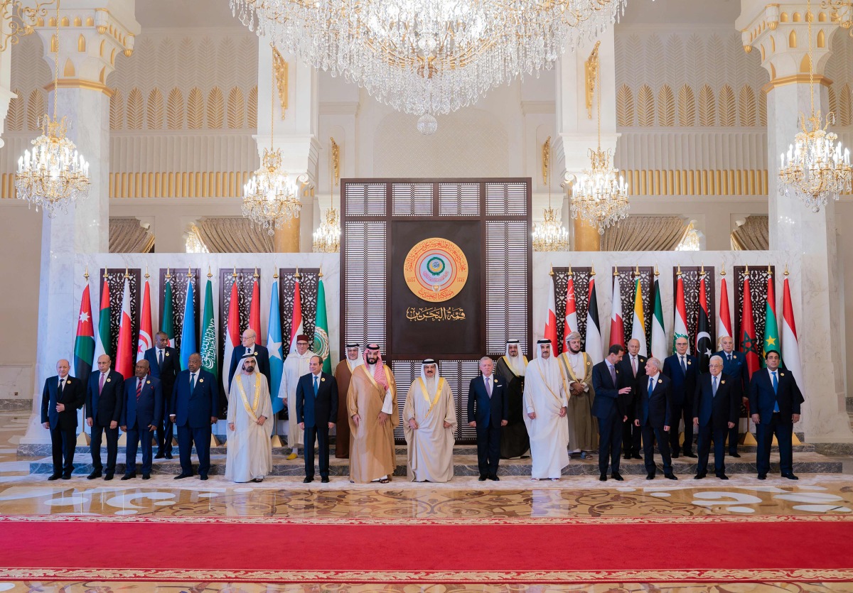 This handout picture from the official Bahrain News Agency (BNA) shows Bahrain's King Hamad bin Isa al-Khalifa (C) posing with Arab leaders in Manama on May 16, 2024 ahead of the 33rd Arab League Summit. (Photo by BNA (Bahrain News Agency)