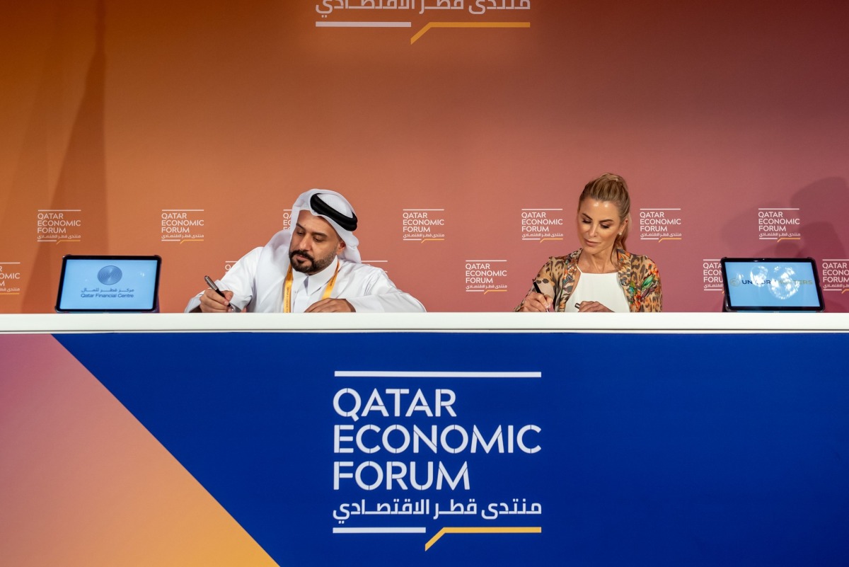 QFC CEO, Yousuf Mohamad Al Jaidah and CEO and co-founder of Unicorn Inc., Silvina Moschini, signing the MoU.