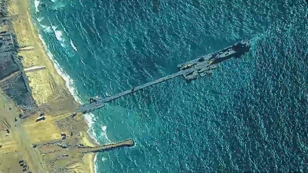 This handout picture courtesy of the US Central Command (CENTOCOM) taken on May 16, 2024 shows US Army soldiers emplace the Trident Pier on the Gaza coast. (Photo by US Central Command (CENTCOM) / AFP) 