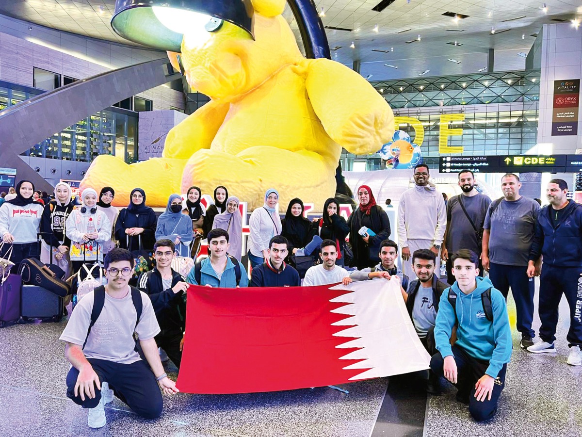 A group photo of Qatar Team participating in DI Global Finals in the US, at Hamad International Airport, Doha.