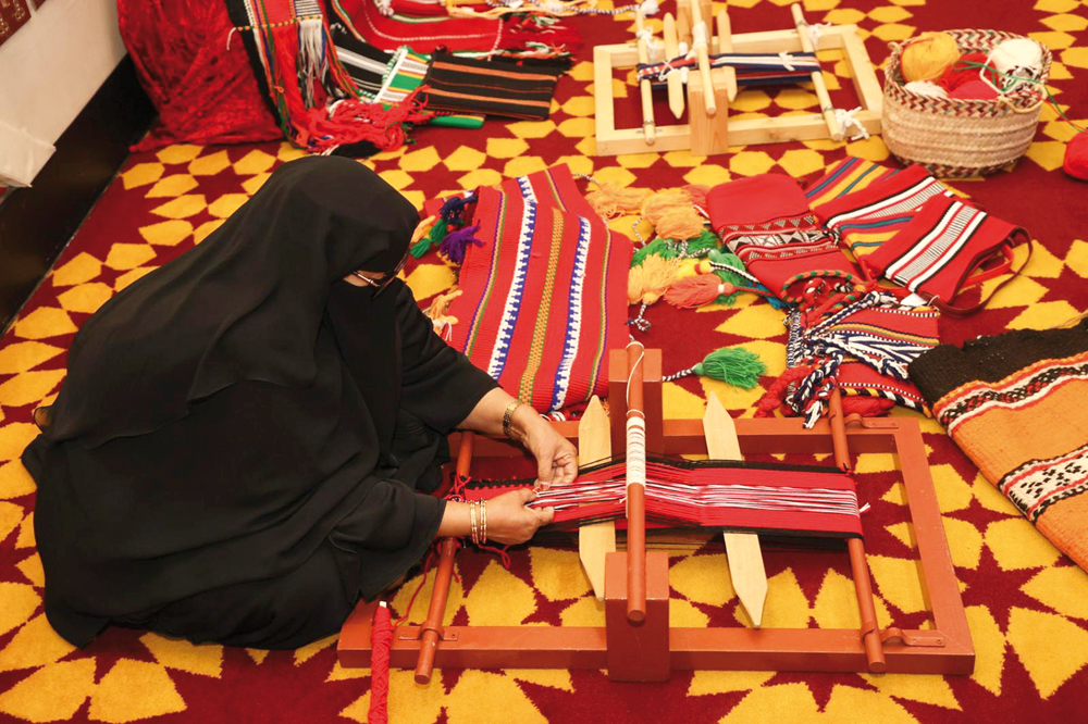 A woman doing a traditional Bedouin weaving called Sadu during a symposium at Katara yesterday to celebrate the International Day for Cultural Diversity, which falls every May 21 annually.