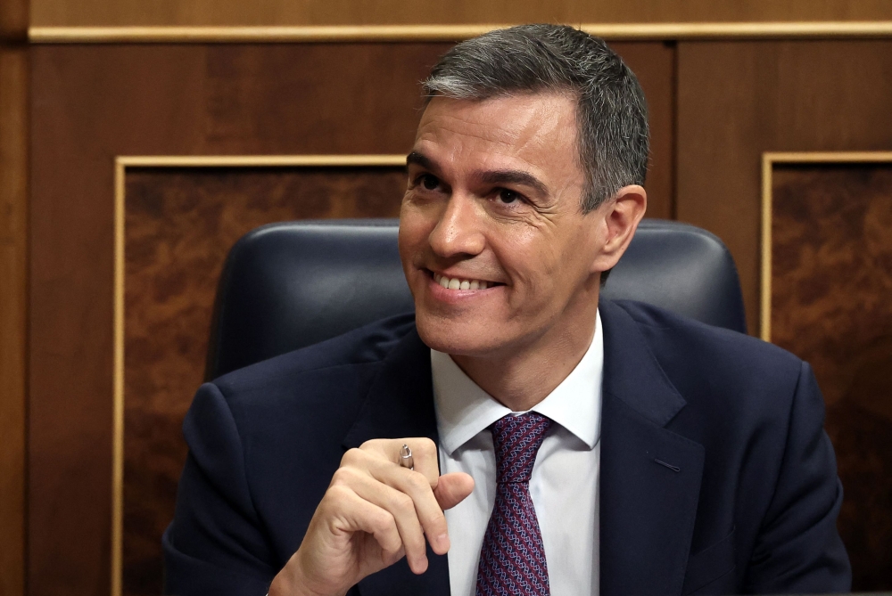 Spain's Prime Minister Pedro Sanchez looks on after delivering a speech to announce that Spain will recognise Palestine as a state on May 28, at the Congress of Deputies in Madrid on May 22, 2024. (Photo by Thomas Coex / AFP)