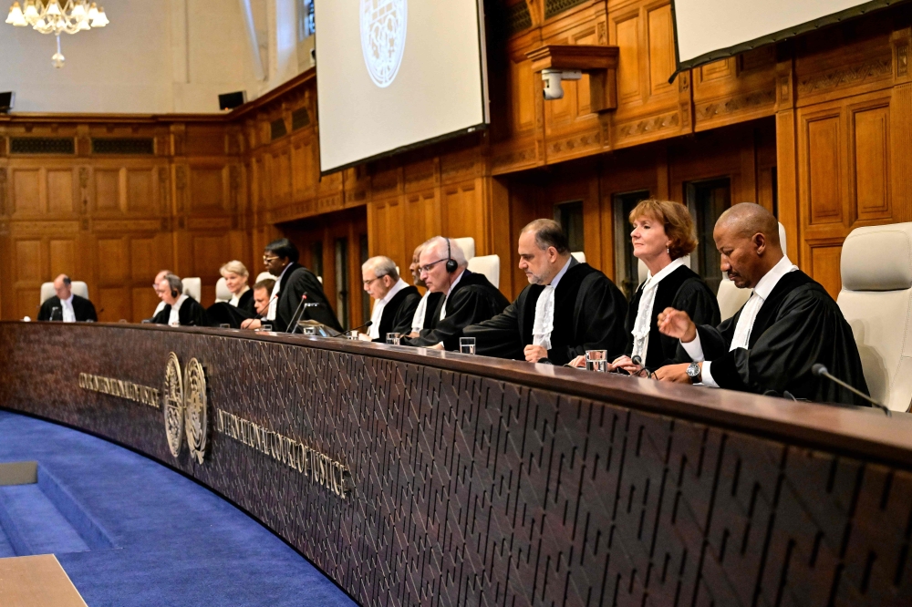 Magistrates are seen at the International Court of Justice (ICJ) as part of South Africa's request on a Gaza ceasefire in The Hague, on May 24, 2024. Photo by Nick Gammon / AFP