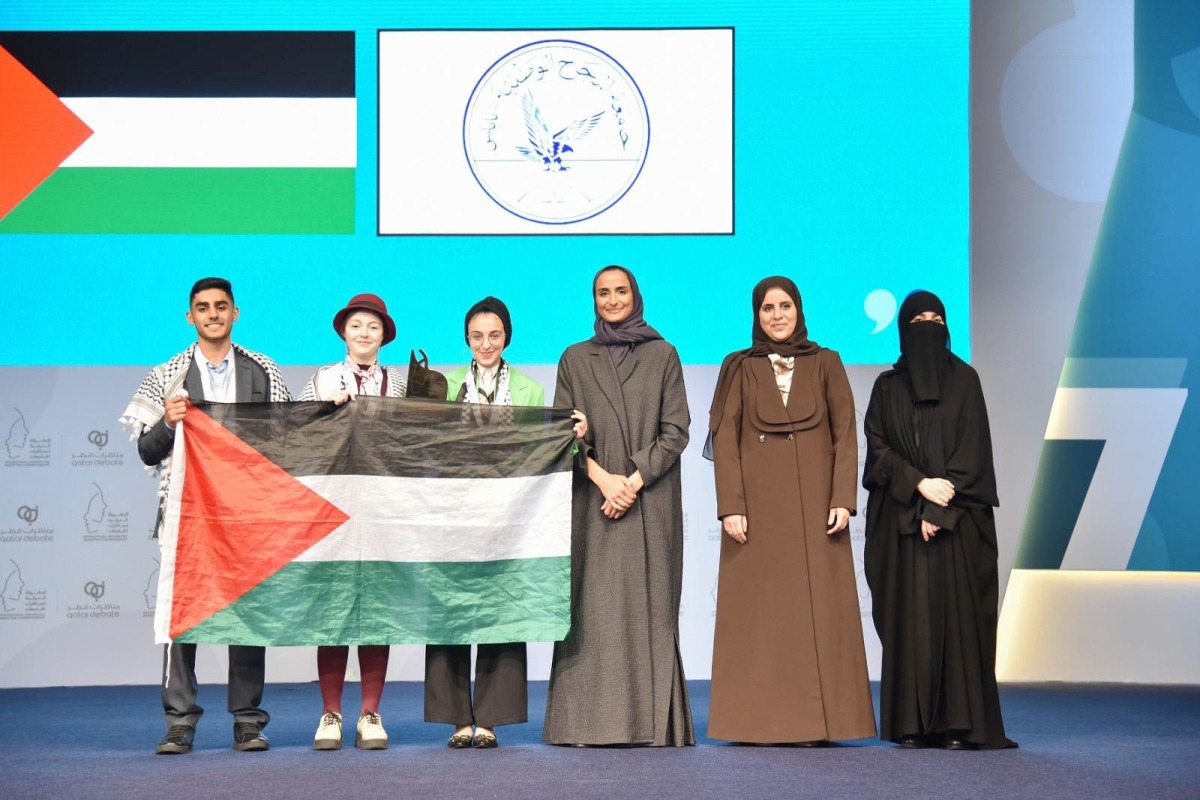 Vice Chairperson and CEO of Qatar Foundation H E Sheikha Hind bint Hamad Al Thani honours the winning team from An-Najah National University in Palestine.