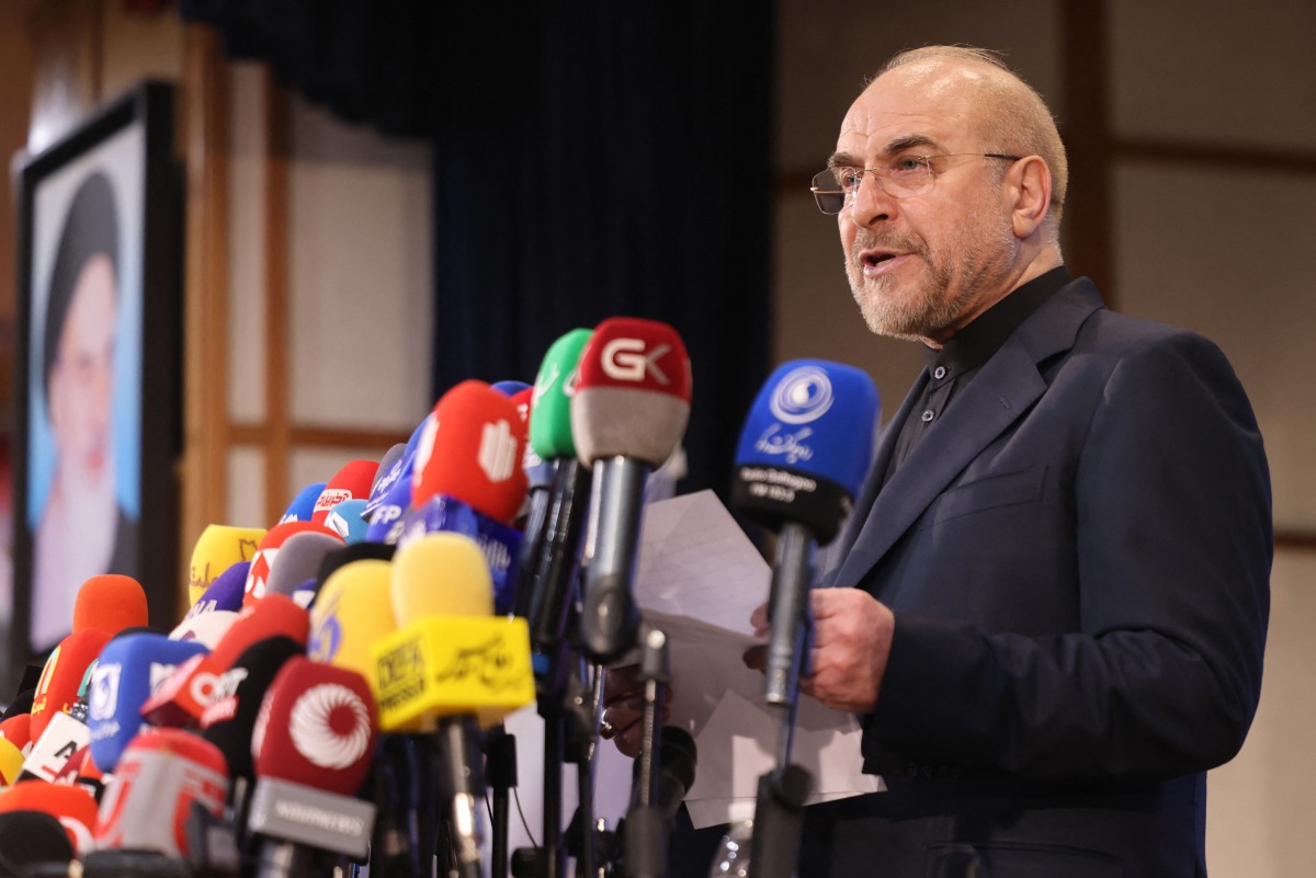 Iran's Parliament Speaker Mohammad Bagher Ghalibaf addresses the media after submitting his candidacy for the Islamic republic's upcoming presidential election in Tehran on June 3, 2024. (Photo by ATTA KENARE / AFP)
