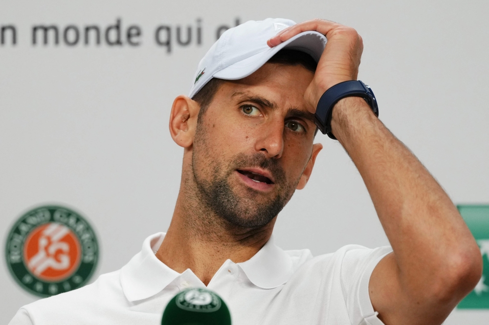 Serbia's Novak Djokovic hold a press conference on day five of the French Open tennis tournament at the Roland Garros Complex in Paris on May 30, 2024. (Photo by Dimitar DILKOFF / AFP)