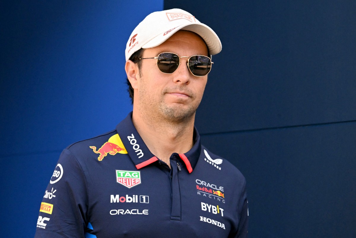 Red Bull Racing's Mexican driver Sergio Perez walks in the paddock ahead of the Formula One Monaco Grand Prix on May 26, 2024 at the Circuit de Monaco. (Photo by NICOLAS TUCAT / AFP)