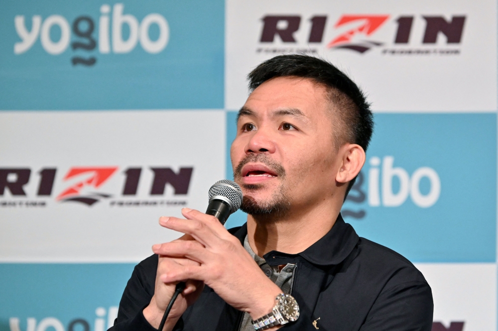 Retired multiple world boxing champion Manny Pacquiao of the Philippines speaks during a press conference at a hotel in Tokyo on June 10, 2024. (Photo by Kazuhiro Nogi / AFP)