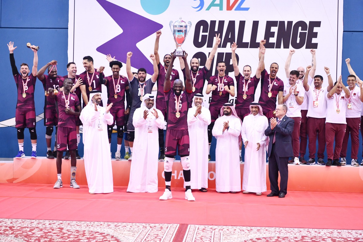 Qatar players celebrate on the podium after winning the Asian Men’s Volleyball Challenge Cup title, yesterday.