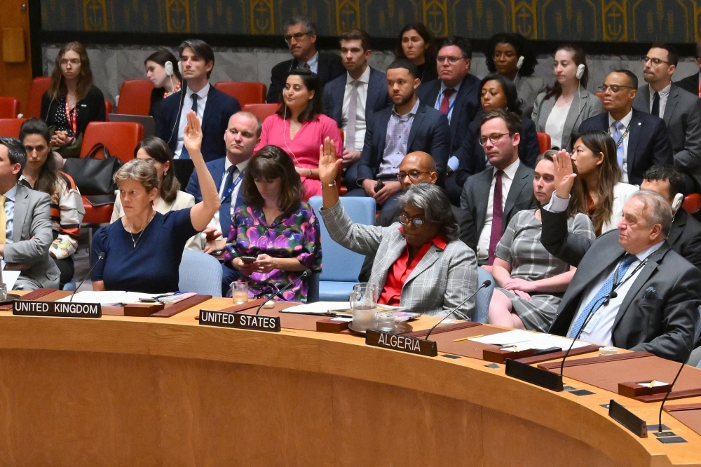 US Ambassador to the United Nations Linda Thomas-Greenfield (C) votes during a UN Security Council meeting on the situation in the Middle East at UN headquarters on June 10, 2024 in New York. (Photo by Angela Weiss / AFP)