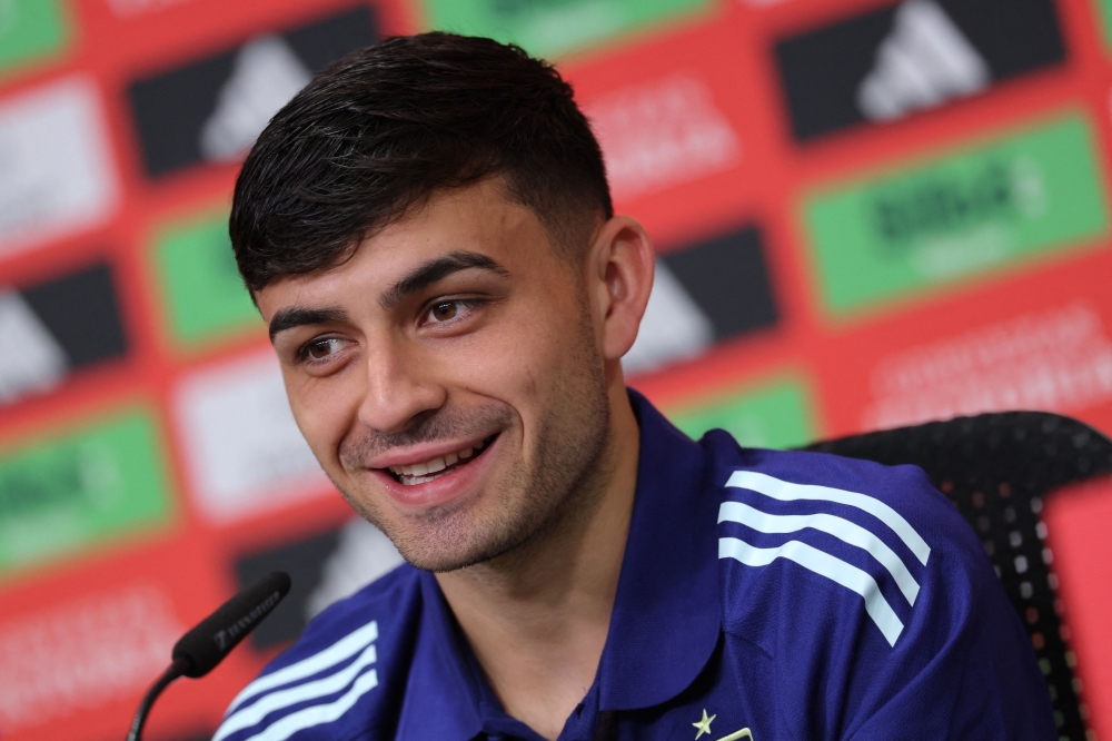 Spain's midfielder #20 Pedri speaks during a press conference at the team's training camp in Donaueschingen on June 11, 2024, ahead of the UEFA EURO 2024 football competition. (Photo by LLUIS GENE / AFP)