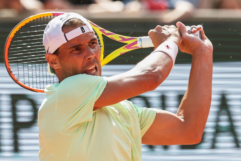 File: Spain's Rafael Nadal takes part in a practice session during the French Open tennis tournament on Court Philippe-Chatrier at the Roland Garros Complex in Paris on May 25, 2024. (Photo by Alain Jocard / AFP)