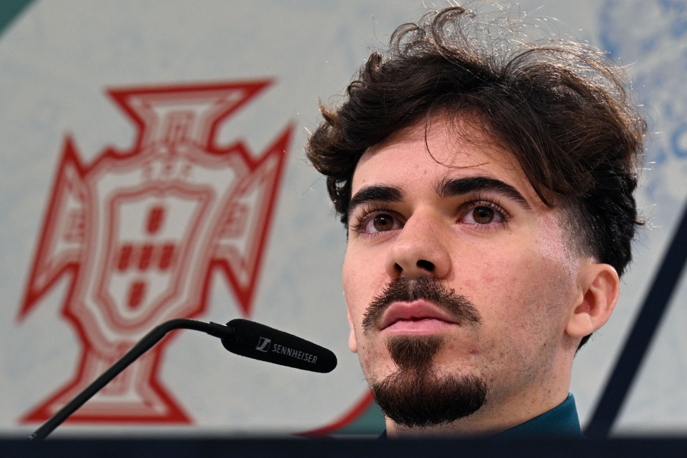 Portugal's midfielder #23 Vitinha attends a press conference in Harsewinkel on June 14, 2024, ahead of the UEFA Euro 2024 Football Championship. (Photo by Patricia De Melo Moreira / AFP)
