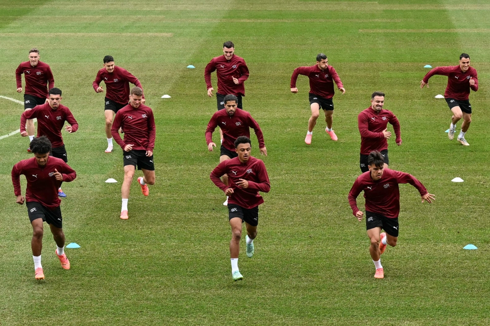 Switzerland's players take part in a MD-1 training session in Stuttgart on June 14, 2024. (Photo by Thomas Kienzle / AFP)
 