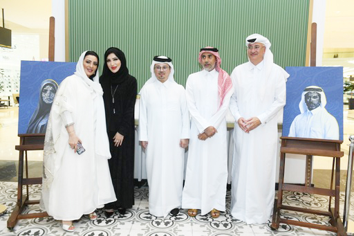 Qatari writer Hamad Al Tamimi (second right) and Qatari artist Ahmed Nooh (centre) along with officials during the ceremony.