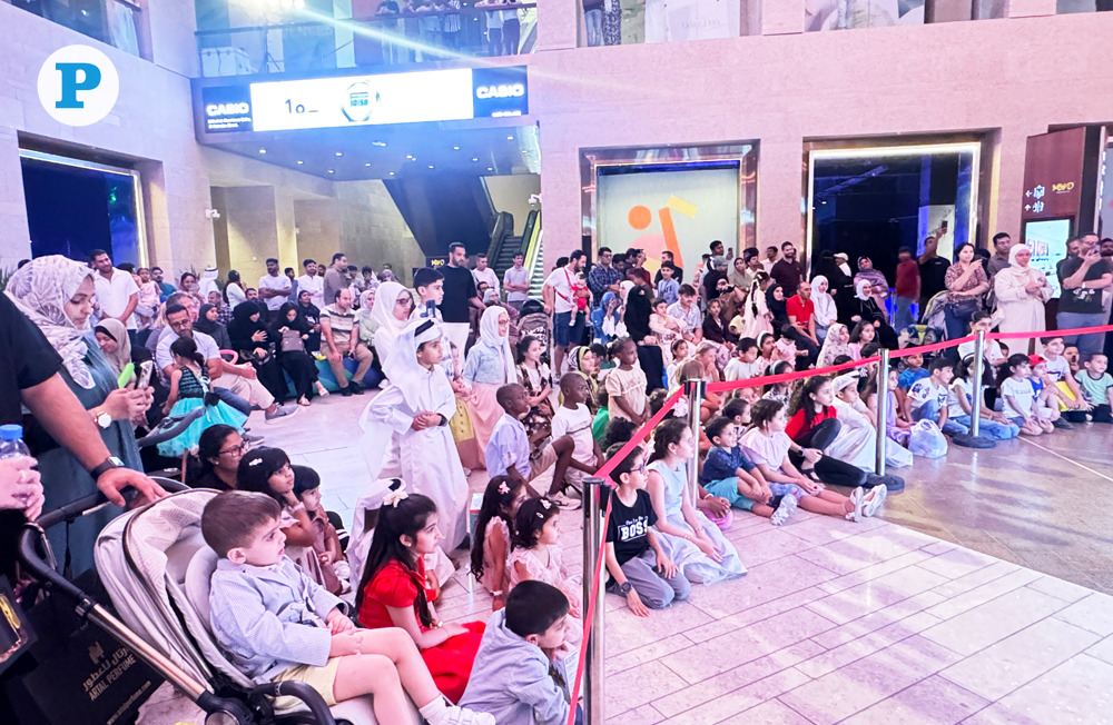 Children watch a fun show as part of Eid Al Adha festivities. (Photos: Mohamed Farag/The Peninsula)