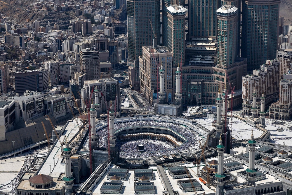 An aerial view shows Mecca's Grand Mosque with the Kaaba, Islam's holiest site in the centre on June 17, 2024, during the annual Hajj pilgrimage. (Photo by Fadel Senna / AFP)