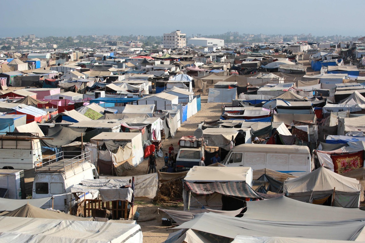 A picture shows a displacement camp in the al-Mawasi area in Khan Yunis in the southern Gaza Strip on June 20, 2024, amid the ongoing conflict in the Palestinian territory. (Photo by Bashar TALEB / AFP)