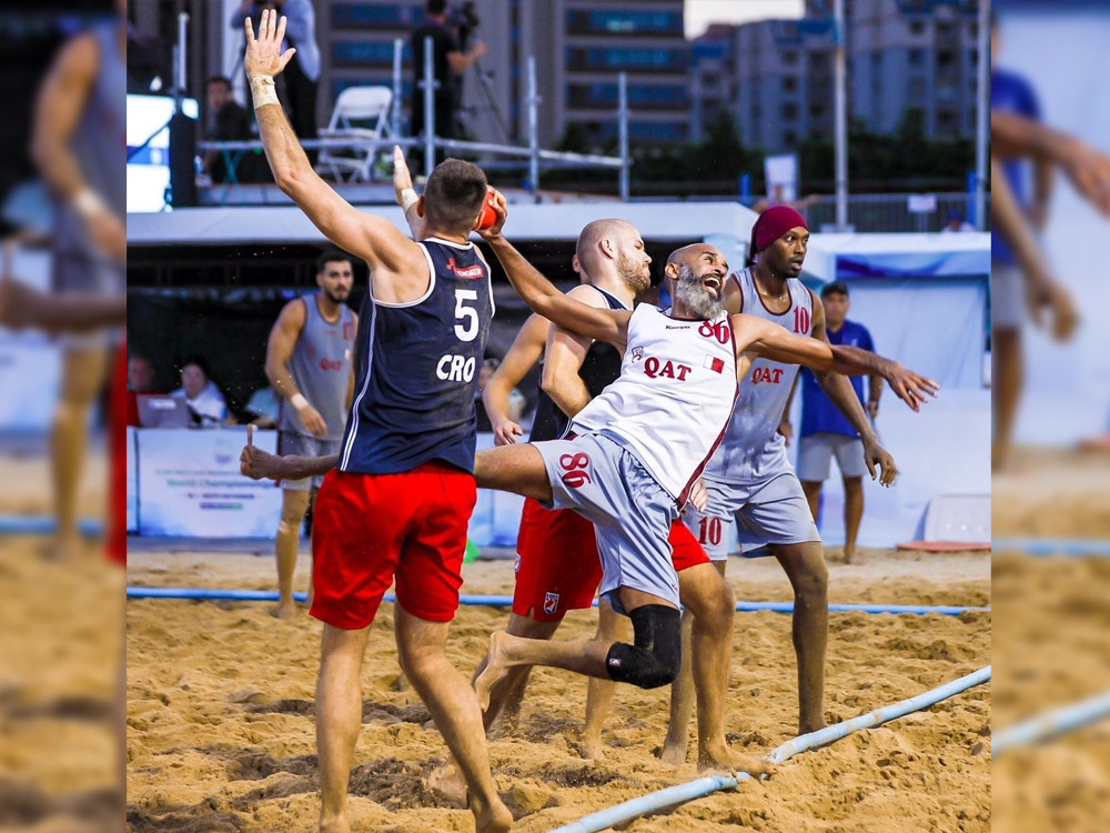 Qatar's Ahmed Hassan Mohamed prepares to shoot at the goal.