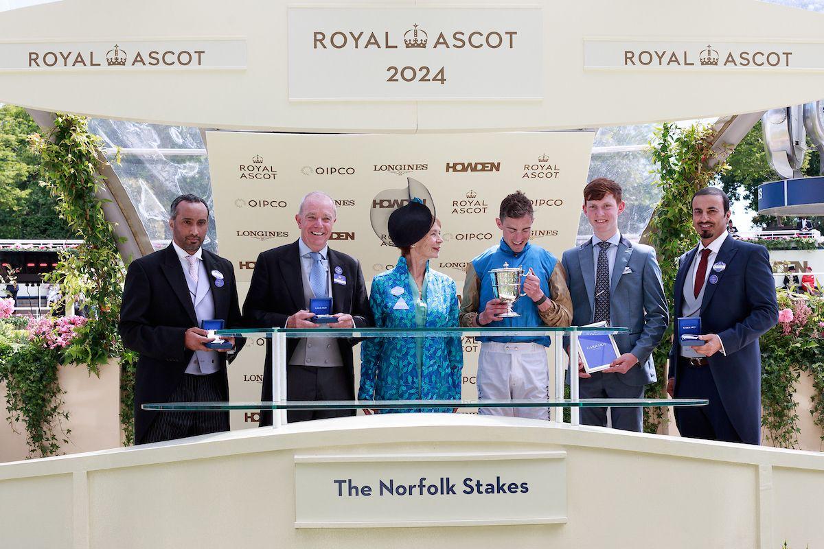 The connections of Shareholder pose with the trophies after winning the Gr.2 Norfolk Stakes. 