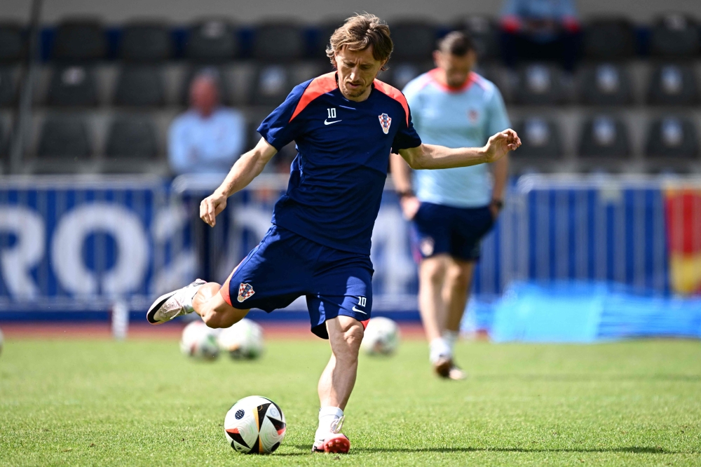 Croatia's midfielder #10 Luka Modric attends a MD-1 training session at the team's base camp in Neuruppin on June 23, 2024, on the eve of their UEFA Euro 2024 football match against Italy. (Photo by Gabriel Bouys / AFP)