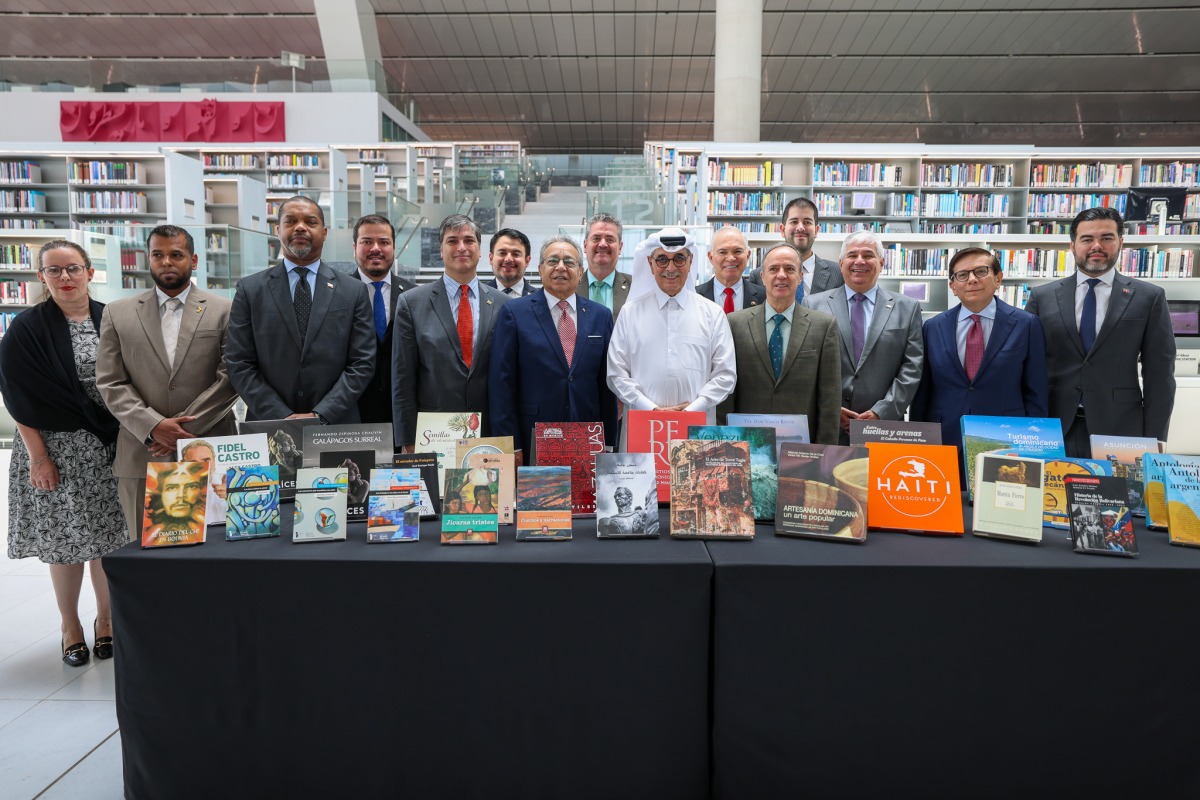 Minister of State and President of Qatar National Library H E Dr. Hamad bin Abdulaziz Al Kawari and Jose Benzaquen, Peru’s Ambassador to Qatar and Dean of the Group of Latin America and Caribbean Embassies to Qatar, along with the ambassadors of the group’s countries during the ceremony.
