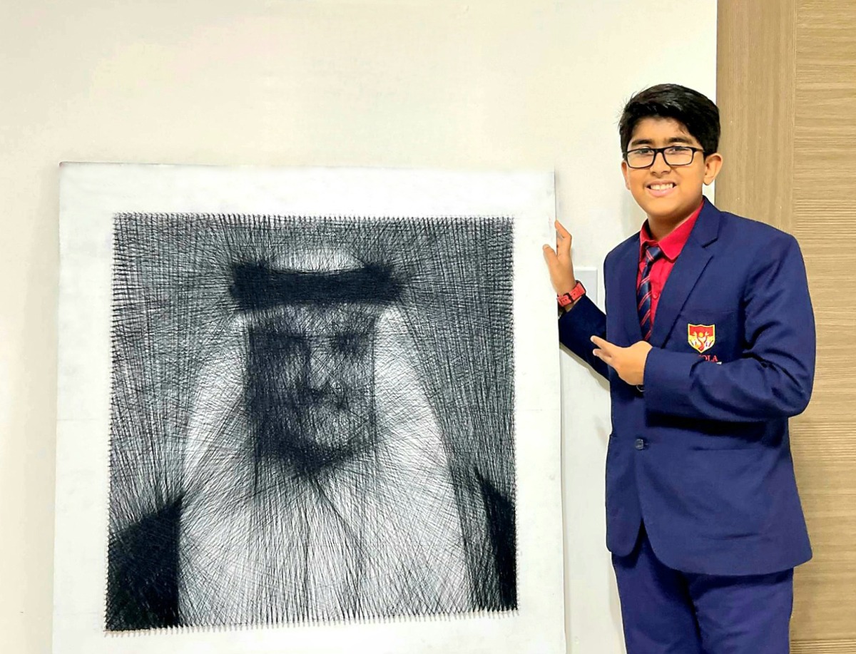 Dhyan Sreejith with his string art portrait of HH the Amir