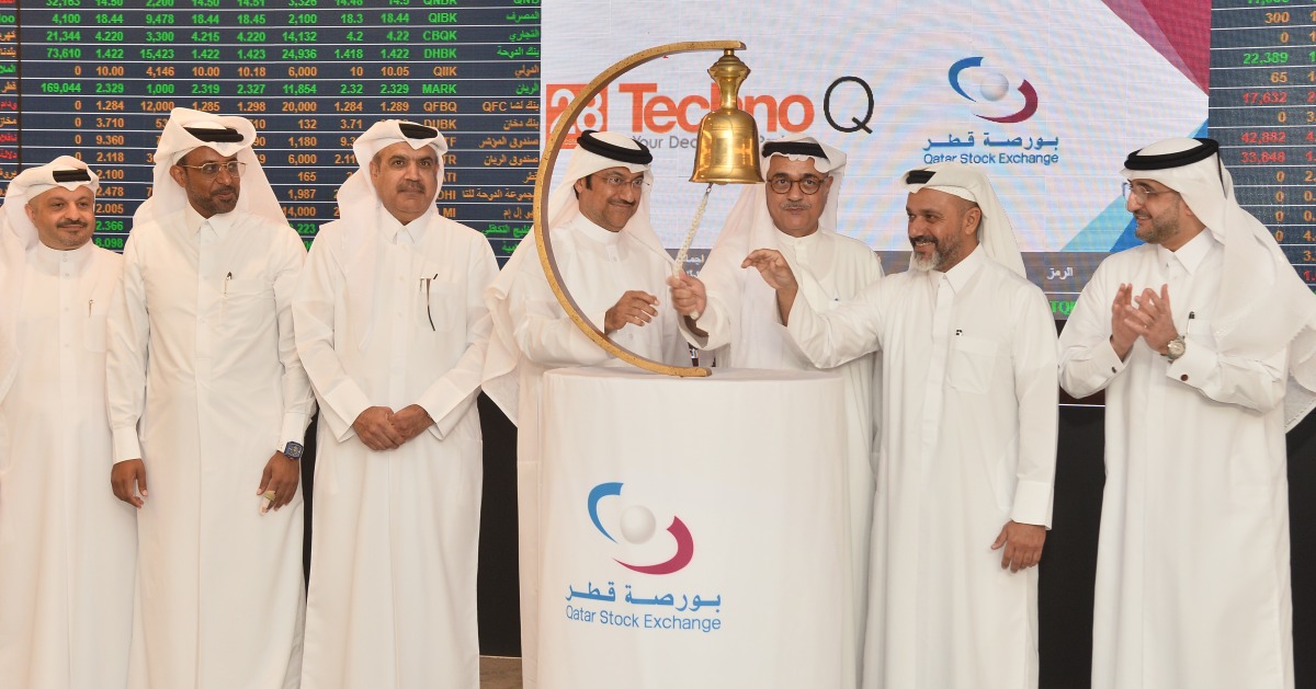 Abdul Aziz Nasser Al Emadi, Acting CEO of Qatar Stock Exchange; Abdulla Al Ansari, Chief Executive Officer and Co-founder of Techno Q; Managing Director and Co-founder of Techno Q, Zeyad Al Jaidah along with other officials during the listing ceremony.