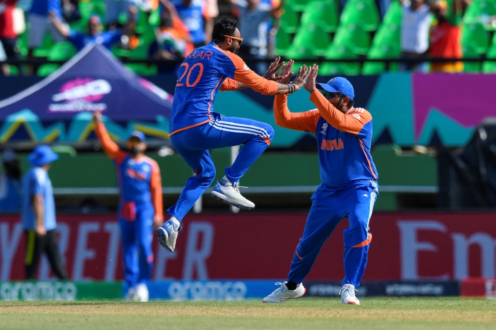 File photo of Indian team during the ICC men's Twenty20 World Cup 2024 semi-final cricket match between India and England on June 27, 2024. (Photo by Randy Brooks / AFP)

