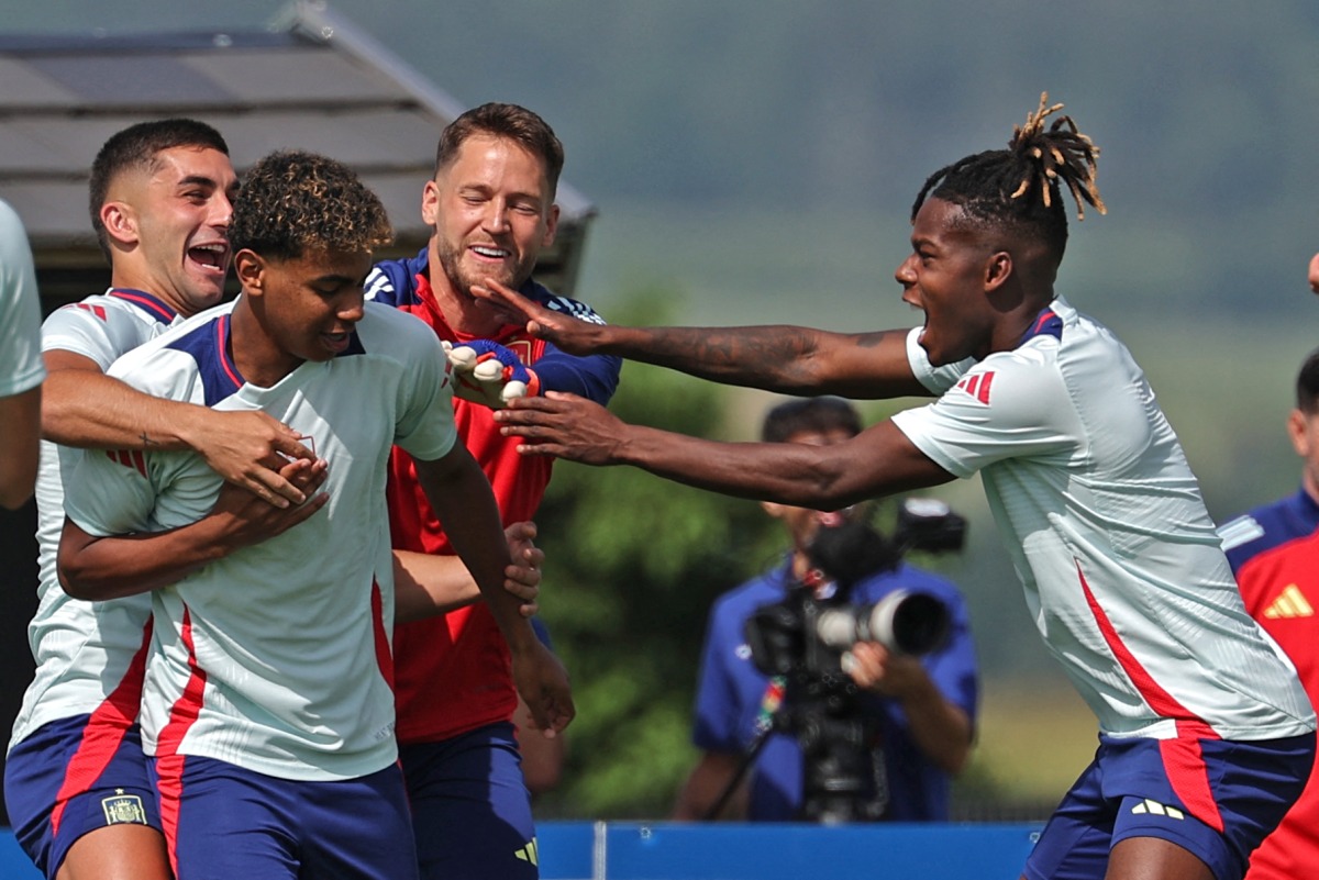 Spain’s Lamine Yamal (second left) and Nico Williams (right) along with their teammates attend a training session at the team’s base camp in Donaueschingen yesterday. AFP 