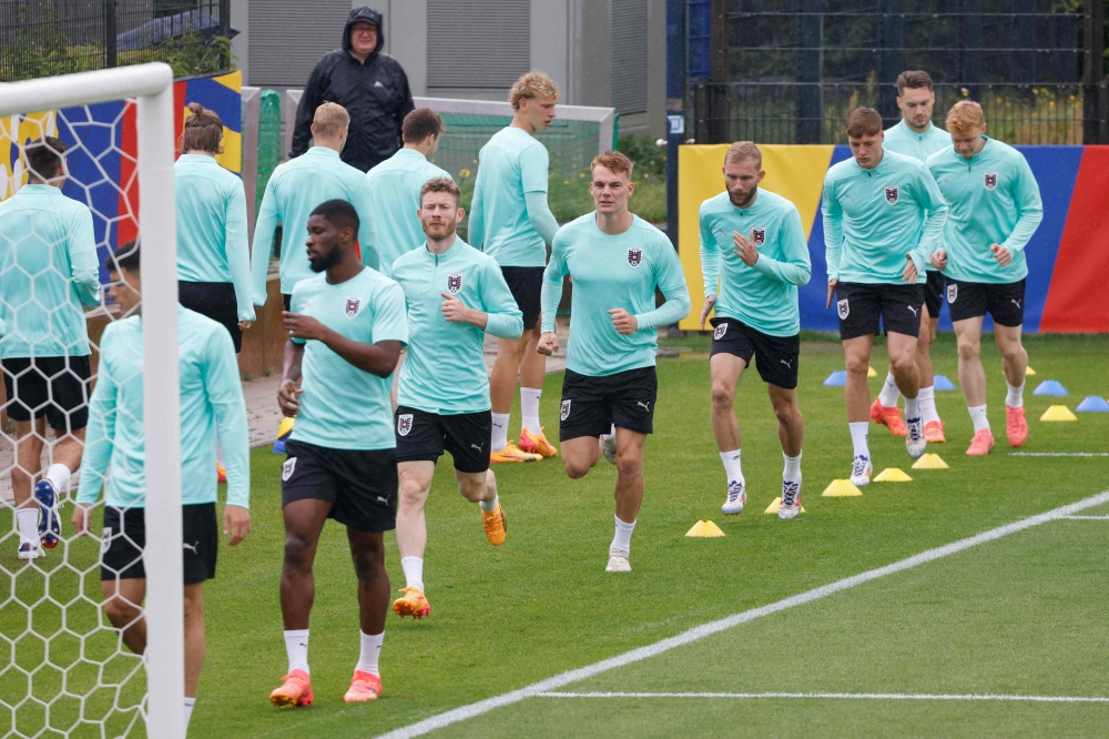 Austria team attends a MD-1 training session at their base camp in Berlin on July 1, 2024, on the eve of their UEFA Euro 2024 Football Championship Round of 16 match against Turkiye. (Photo by Odd Andersen / AFP)