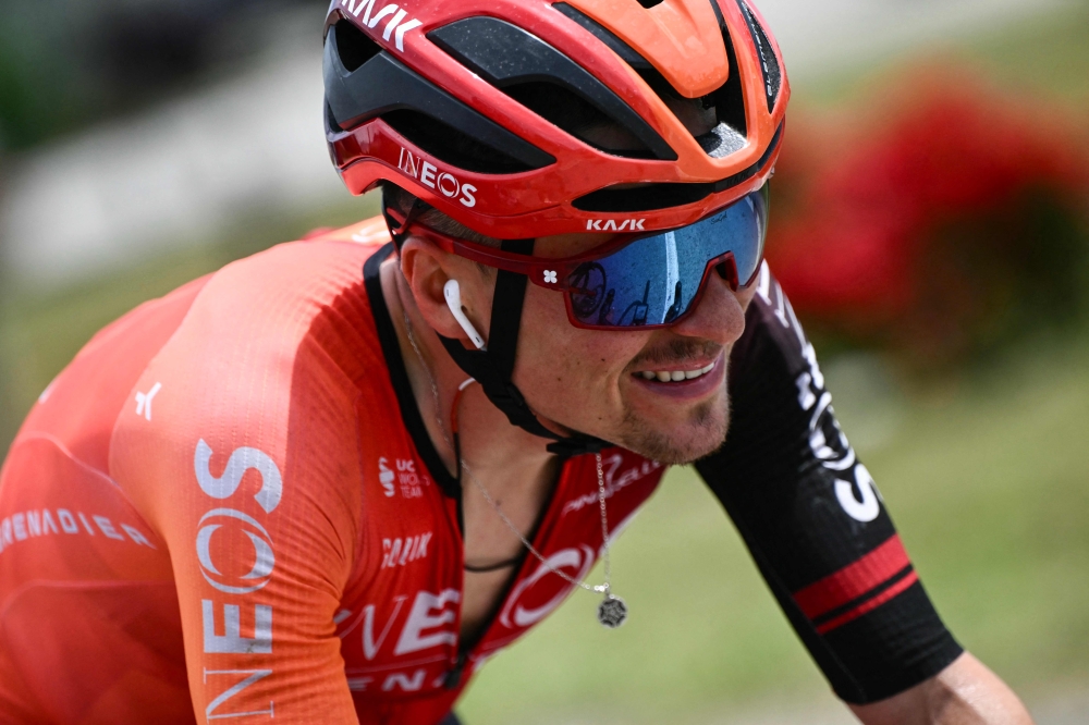 (FILES) INEOS Grenadiers team's British rider Tom Pidcock cycles during the 11th stage of the 111th edition of the Tour de France cycling race, 211 km between ةvaux-les-Bains and Le Lioran, on July 10, 2024. (Photo by Marco BERTORELLO / AFP)
