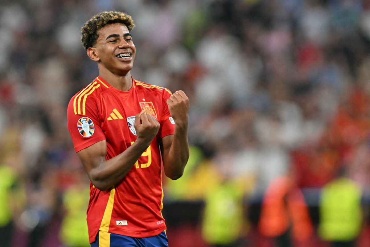 Spain's forward Lamine Yamal celebrates at the end of the UEFA Euro 2024 semi-final football match between Spain and France at the Munich Football Arena in Munich on July 9, 2024. (Photo by MIGUEL MEDINA / AFP)