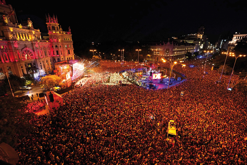 Thousands of fans gather at Cibeles Square to celebrate Spanish players on Monday after the team returned following their Euro 2024 victory. AFP