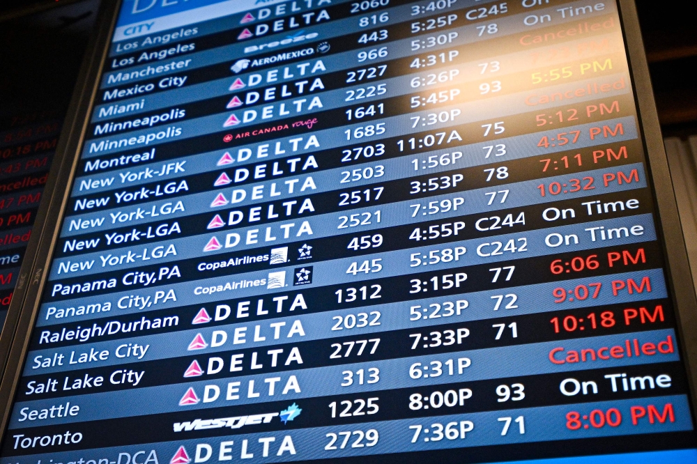 Departure monitors show cancelled and delayed flights due to the global communications outage caused by CrowdStrike at Orlando International Airport on July 19, 2024, in Orlando, Florida. Miguel J. Rodriguez Carrillo/Getty Images/AFP