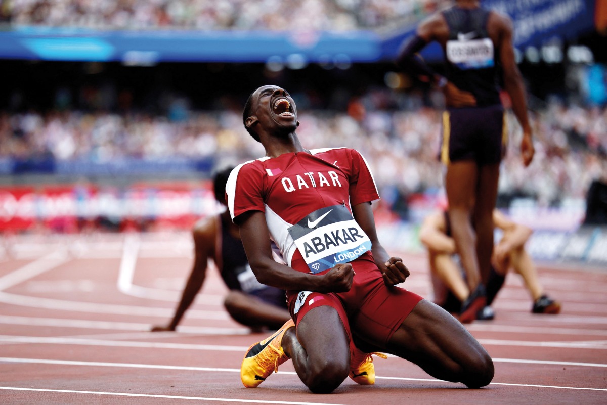 Qatar’s Ismail Doudai Abakar celebrates after achieving a personal best. AFP