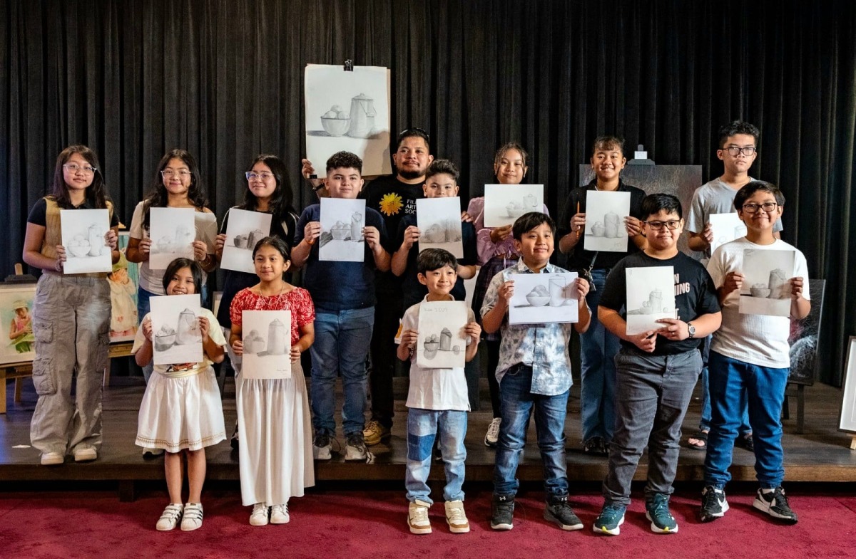 Artist Adrian Aleluya with participants of the Basic Drawing Workshop. Pic: Rommel Lopena