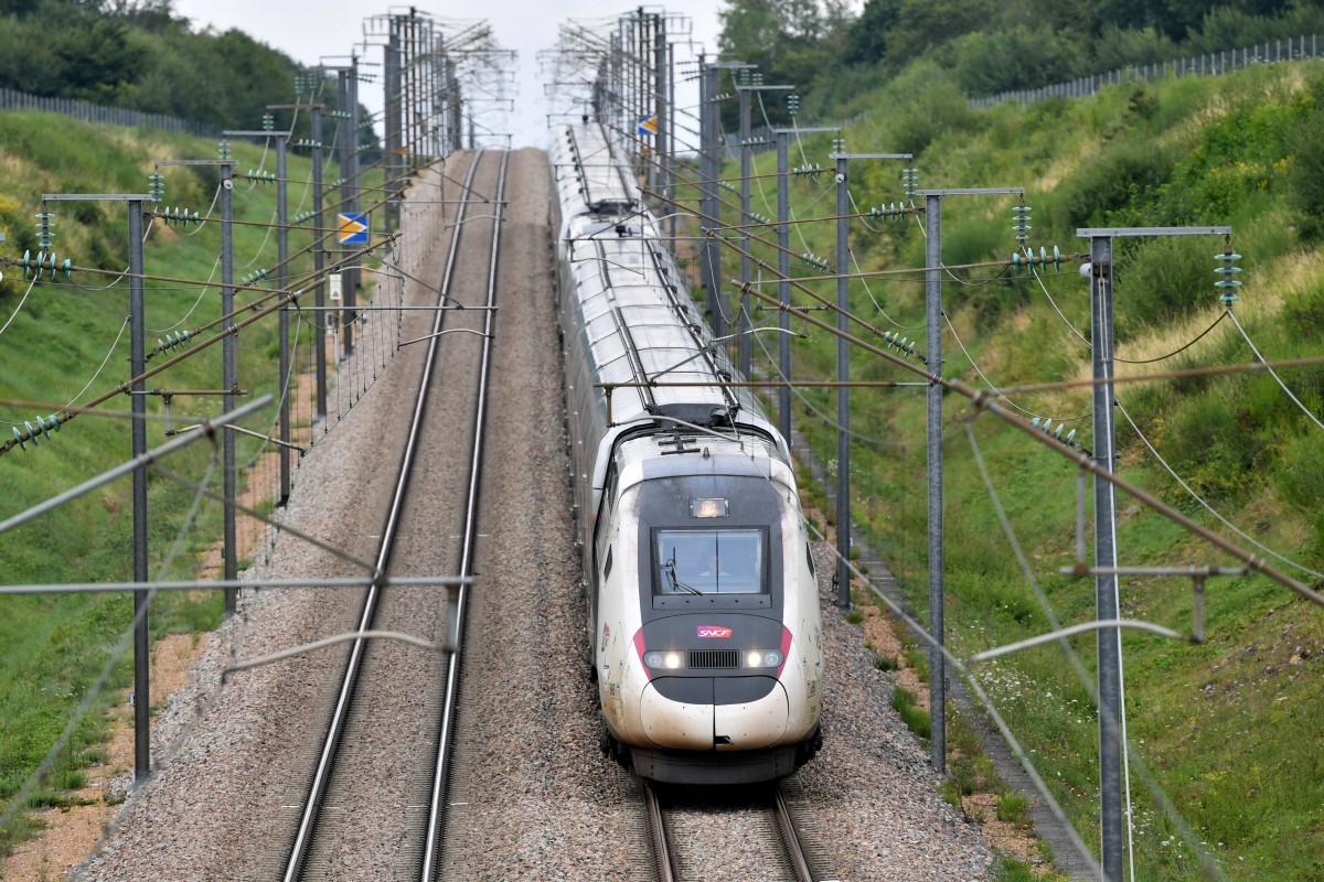 A high-speed train by French railway company SNCF travels on the Bordeaux-Paris route at reduced speed, at Chartres, northern France on July 26, 2024, after the resumption of high speed train services on the line between Paris and Bordeaux, following suspected acts of sabotage on the country's rail network ahead of the opening ceremony of the 2024 Paris Olympic Games. Photo by JEAN-FRANCOIS MONIER / AFP