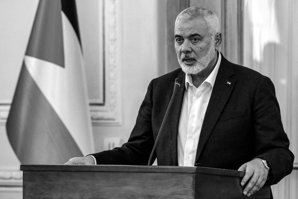 (Files) Ismail Haniyeh, political bureau chief of the Palestinian Islamist movement Hamas, in Tehran on March 26, 2024. (Photo by AFP)
