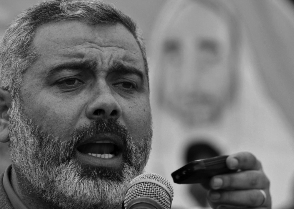 (Files) Hamas leader Ismail Haniyeh addresses supporters during a rally in Gaza City 22 April 2005. (Photo by Mohammed Abed / AFP)