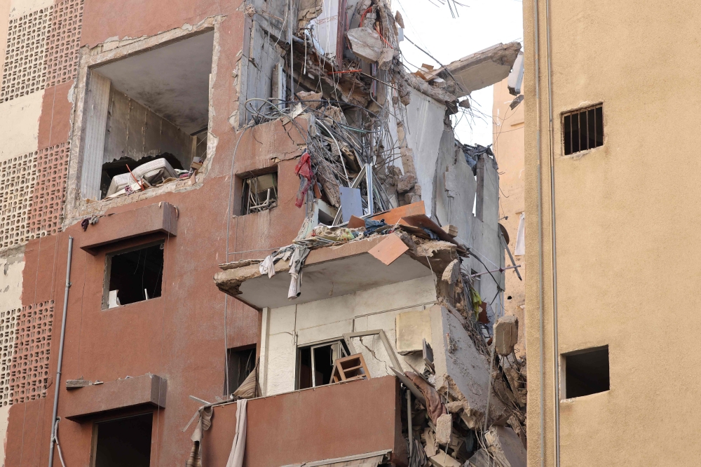 This pictured shows the aftermath of an Israeli military strike on a building in Beirut's southern suburb on July 31, 2024. (Photo by Anwar Amro / AFP)