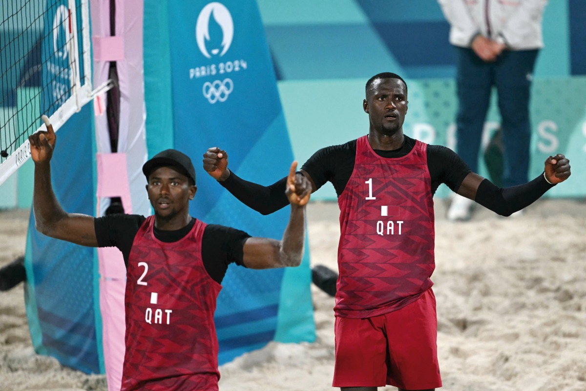 Qatar’s Ahmed Tijan (left) and Cherif Younousse celebrate after defeating Italy's Paolo Nicolai and Samuele Cottafava. AFP