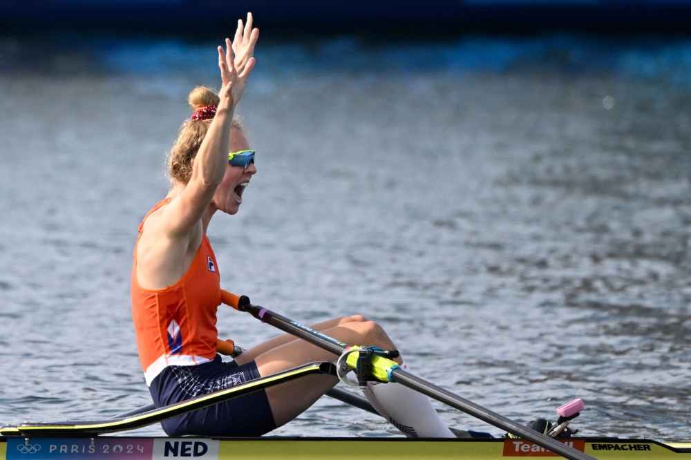 Netherlands' gold medallist Karolien Florijn reacts to winning in the women's single sculls final rowing competition at Vaires-sur-Marne Nautical Centre in Vaires-sur-Marne during the Paris 2024 Olympic Games on August 3, 2024. (Photo by Olivier MORIN / AFP)