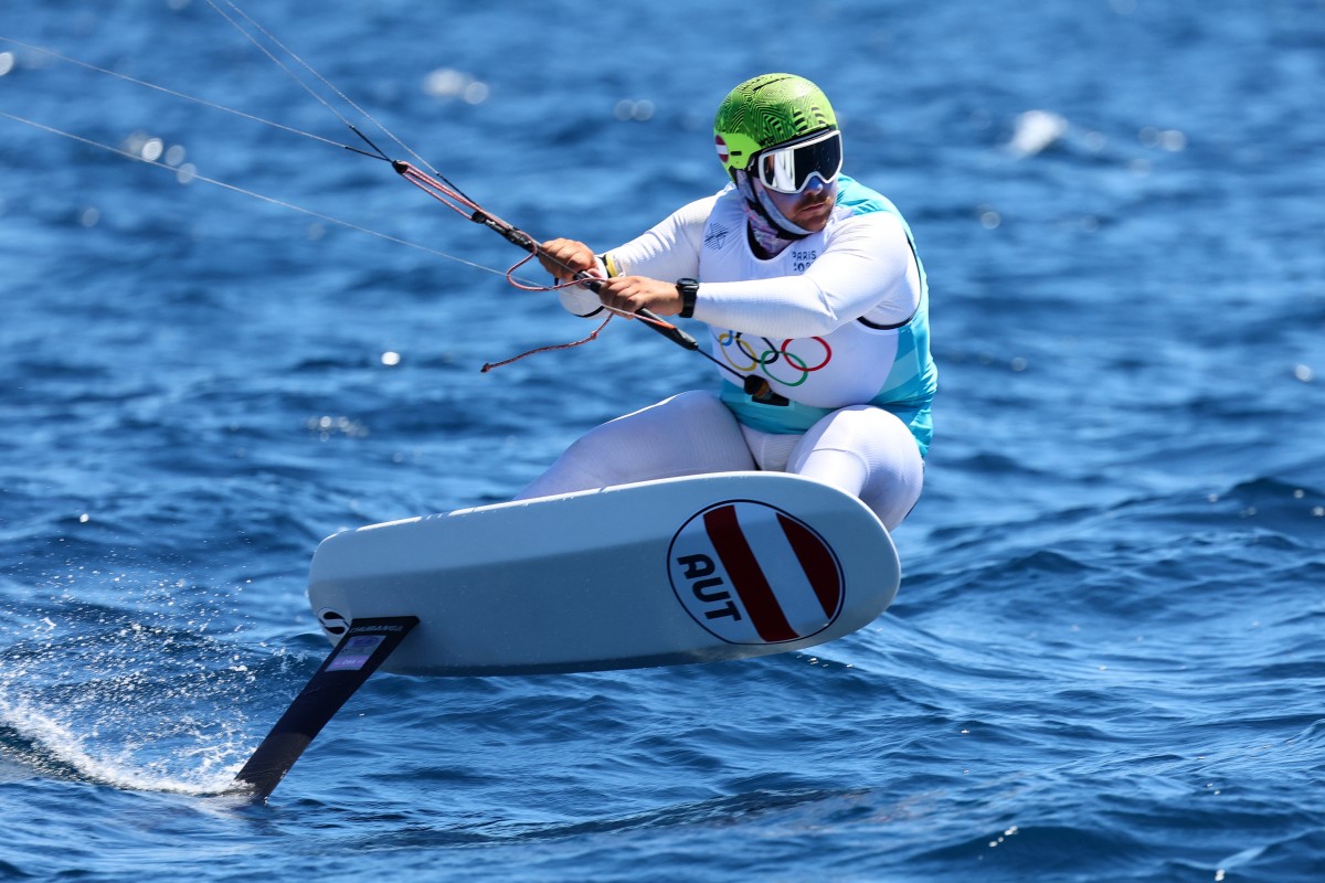 Austria's Valentin Bontus competes in the final races of the men’s formula kite kiteboarding event during the Paris 2024 Olympic Games sailing competition at the Roucas-Blanc Marina in Marseille on August 9, 2024. Photo by Clement MAHOUDEAU / AFP.