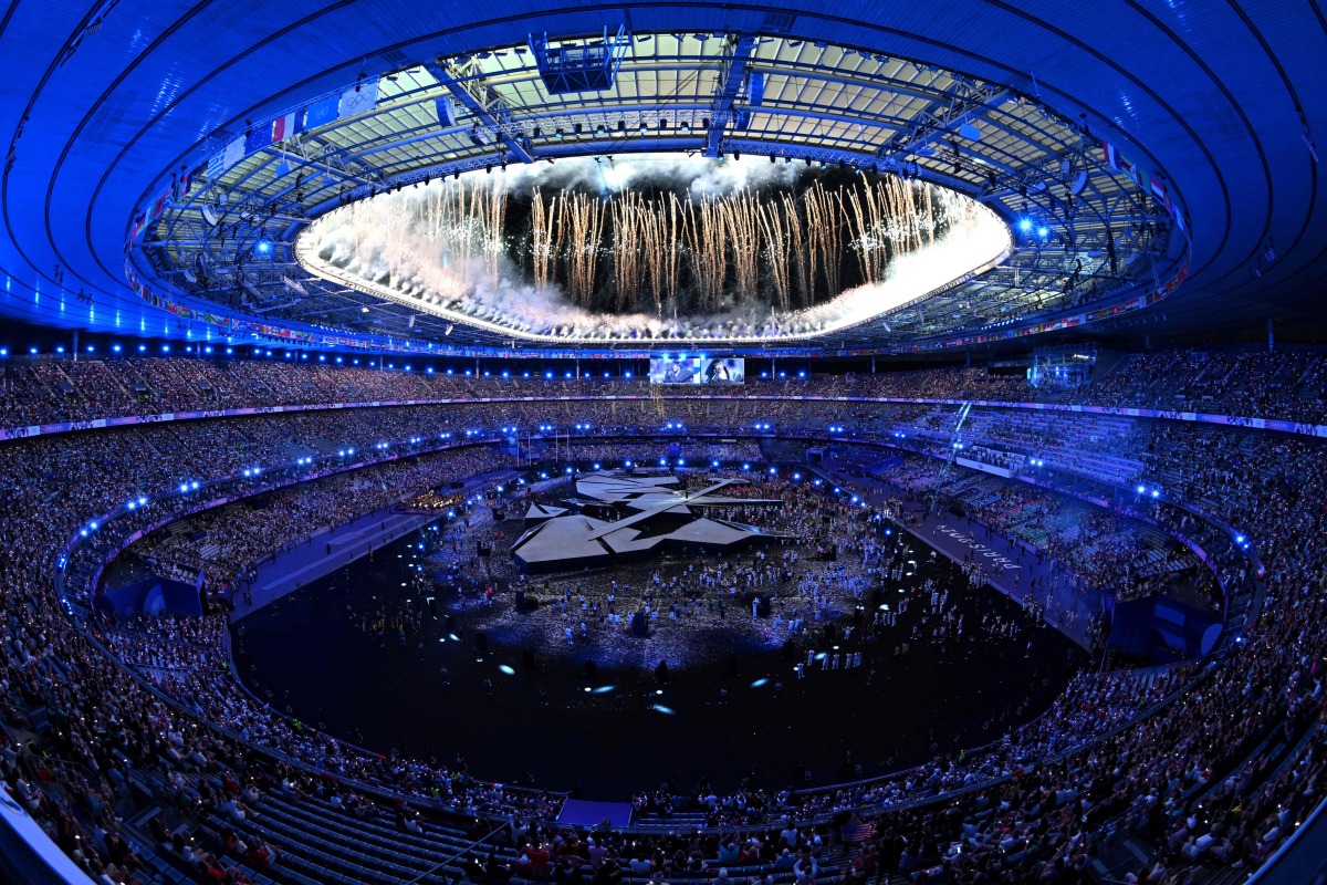 Fireworks sparkle in the sky at the end of the closing ceremony of the Paris 2024 Olympic Games at the Stade de France on Sunday.